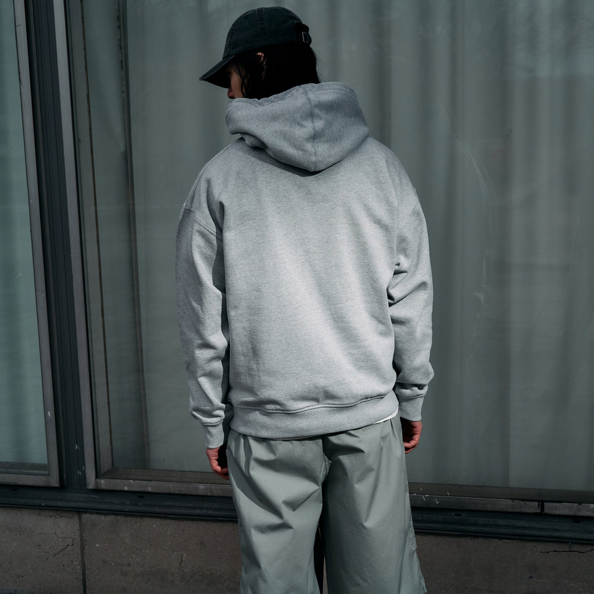 Back side of 'Filastin' on grey Men's Boxy Hoodie with no print