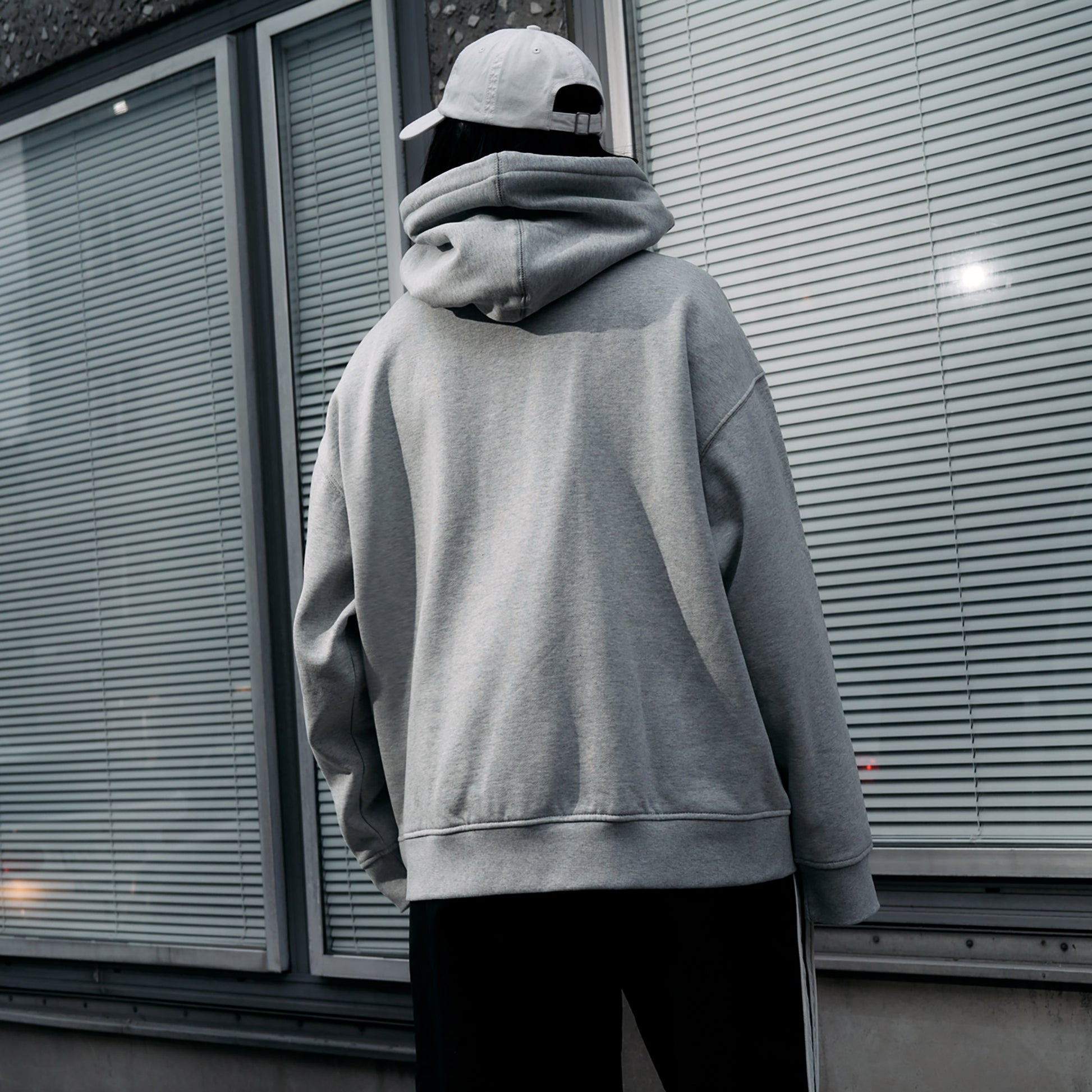 Back side of 'Filastin' on grey Women's Oversized hoodie with no print